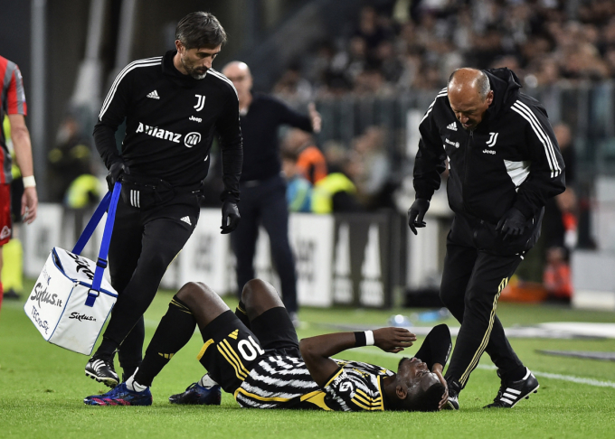 Pogba chấn thương ở phút 24 trận Juventus - Cremonense tối 14/5. Ảnh: Reuters