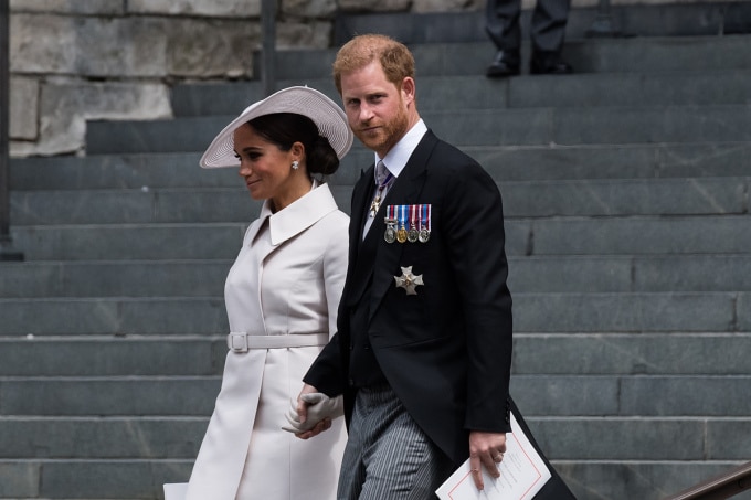 Vợ chồng Harry - Meghan rời Nhà thờ St Paul ở London, thủ đô Anh năm 2022. Ảnh: AFP