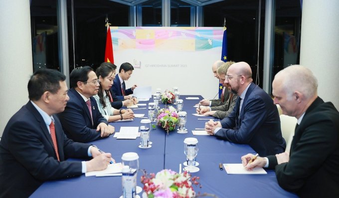 Thủ tướng Phạm Minh Chính tiếp Chủ tịch Hội đồng châu Âu Charles Michel trong khuôn khổ Hội nghị G7 mở rộng, ngày 20/5, tại Hiroshima, Nhật Bản. Ảnh: Đoàn Bắc