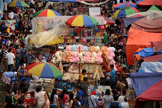 Một khu chợ ở Manila (Philippines). Ảnh: AFP/TTXVN