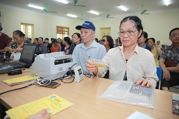 Bo LD-TB&XH huong dan thuc hien viec chi tra luong huu, tro cap moi hinh anh 1