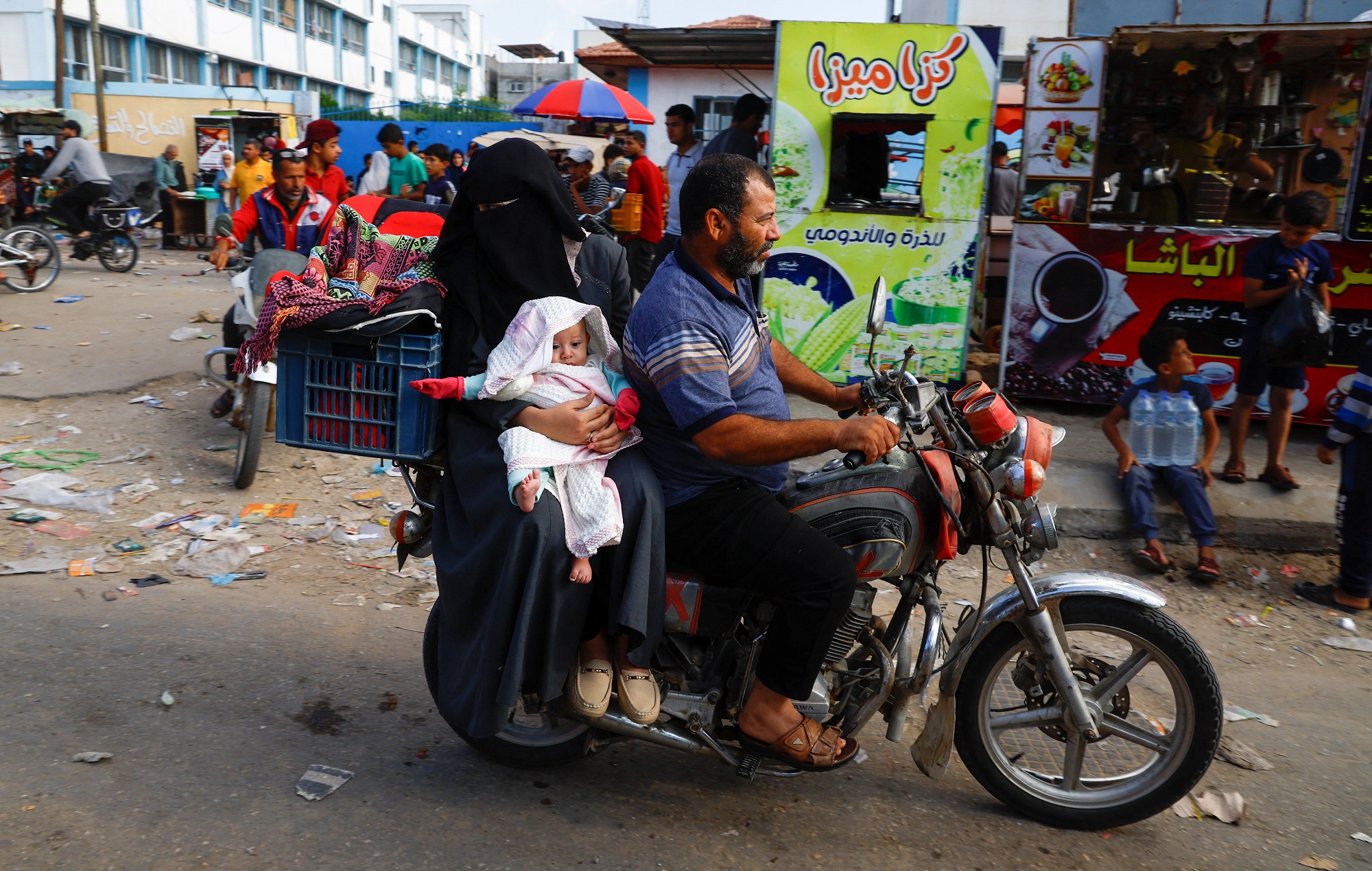 Cuộc sống của người dân ở Gaza qua ảnh lúc xung đột Hamas-Israel tiếp diễn - Ảnh 7.