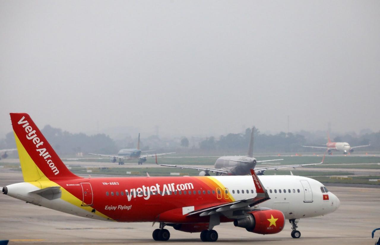 Một máy bay của hãng hàng không Vietjet tại sân bay Nội Bài. Anh: Huy Hùng/TTXVN