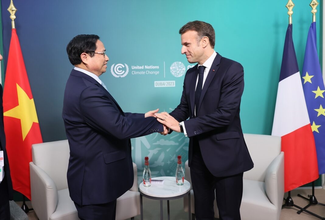 Thủ tướng Phạm Minh Chính gặp Tổng thống Pháp Emmanuel Macron. Ảnh Dương Giang-TTXVN