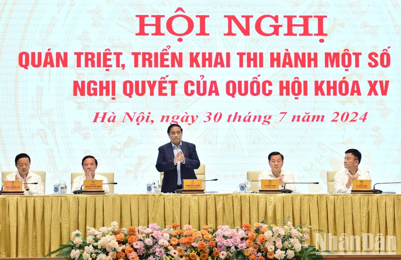 [Ảnh] Thủ tướng chủ trì Hội nghị triển khai thi hành một số Luật, Nghị quyết của Quốc hội ảnh 1