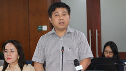 1 Sr. Ho Tan Minh, oficina número 1 2433.jpg