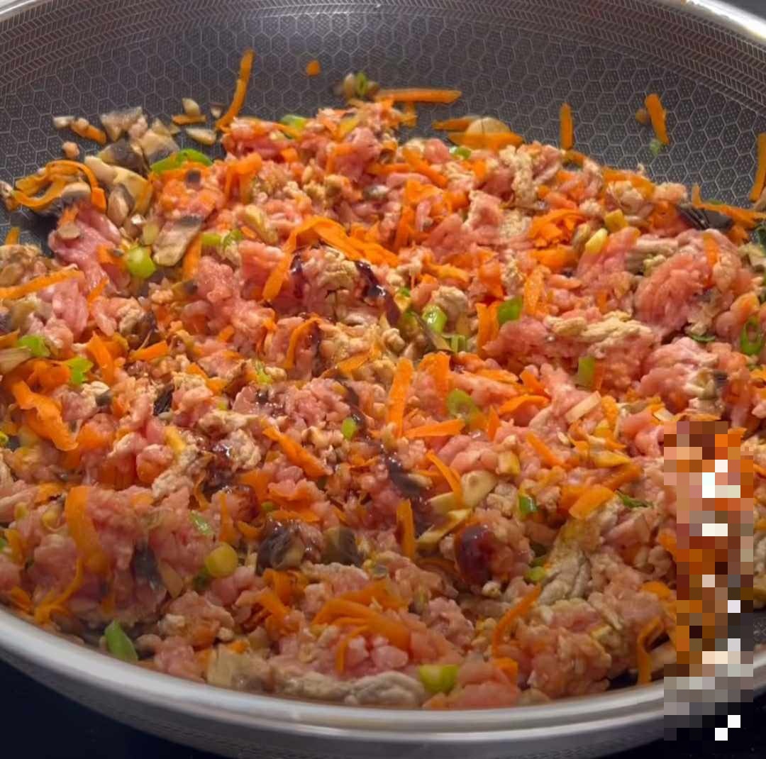 A bowl of food in a pan  Description automatically generated