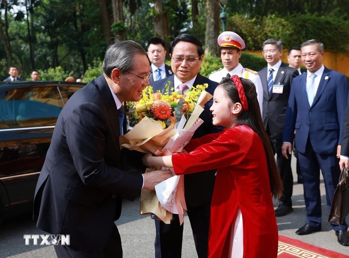 Hình ảnh Thủ tướng Phạm Minh Chính chủ trì Lễ đón chính thức Thủ tướng Trung Quốc Lý Cường - Ảnh 3.