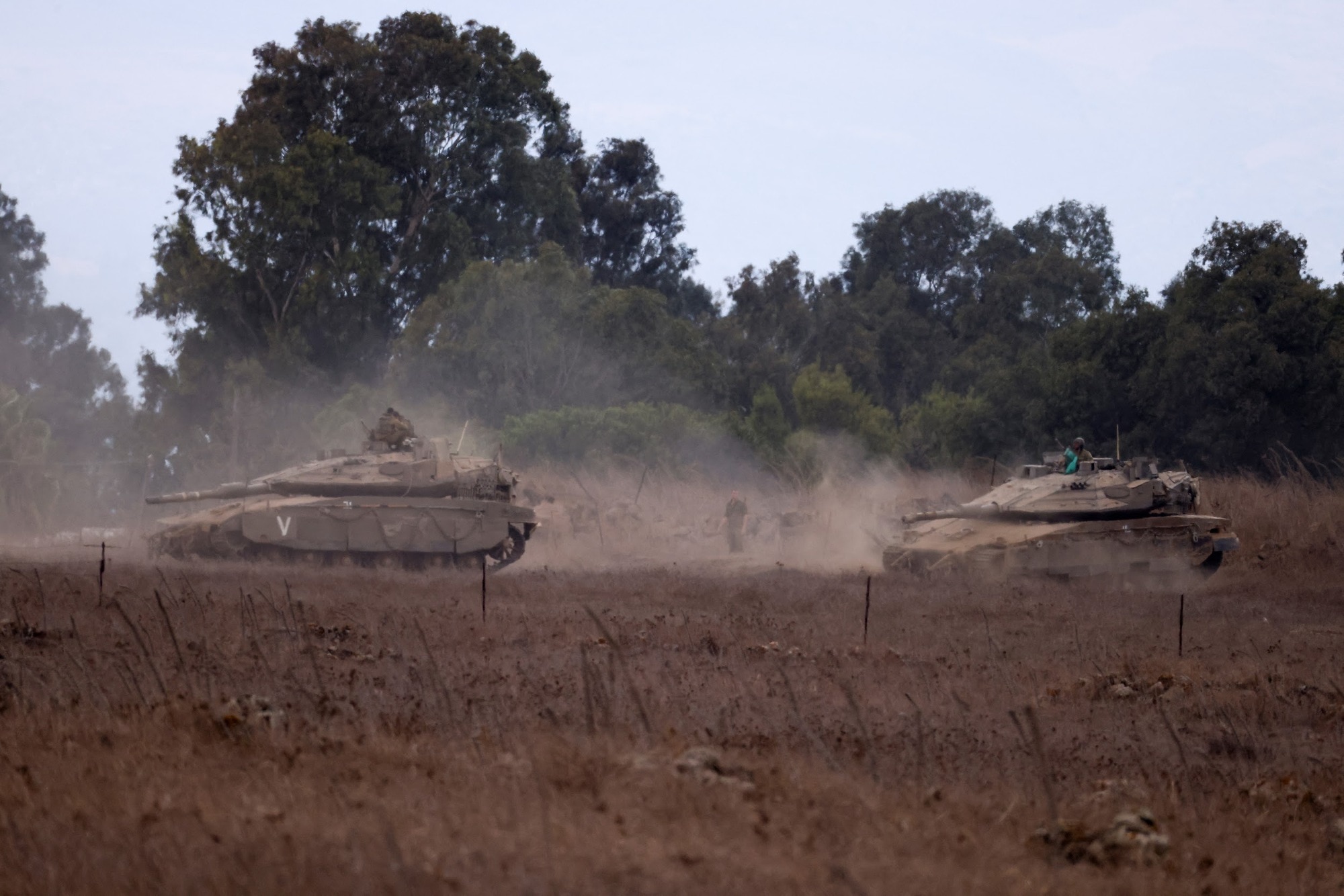 Israeli Army tanks are being moved, in the Israeli-occupied Golan Heights