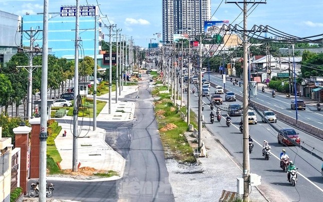 Lo ngại việc đặt trạm thu phí gần đầu cầu gây ùn tắc giao thông trên quốc lộ 13 ảnh 1