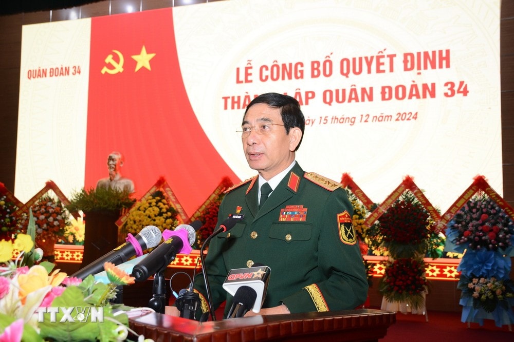 ttxvn_le_cong_bo_quyet_dinh_thanh_lap_quan_doan_34_1512-2.jpg