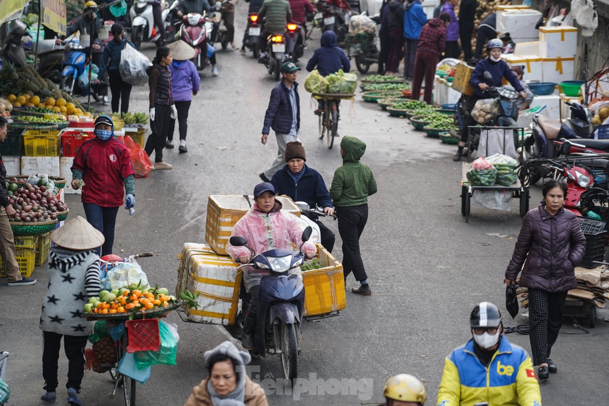 Nhịp sống người dân Thủ đô trong những ngày lạnh 14 độ ảnh 6