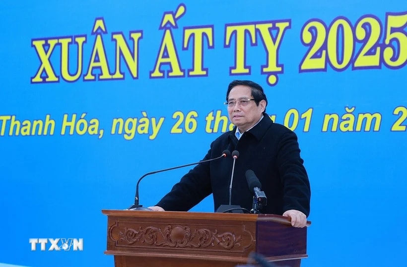 Thủ tướng Phạm Minh Chính chúc Tết gia đình chính sách, công nhân lao động và nhân dân các dân tộc huyện Ngọc Lặc, tỉnh Thanh Hóa. (Ảnh: Dương Giang/TTXVN)