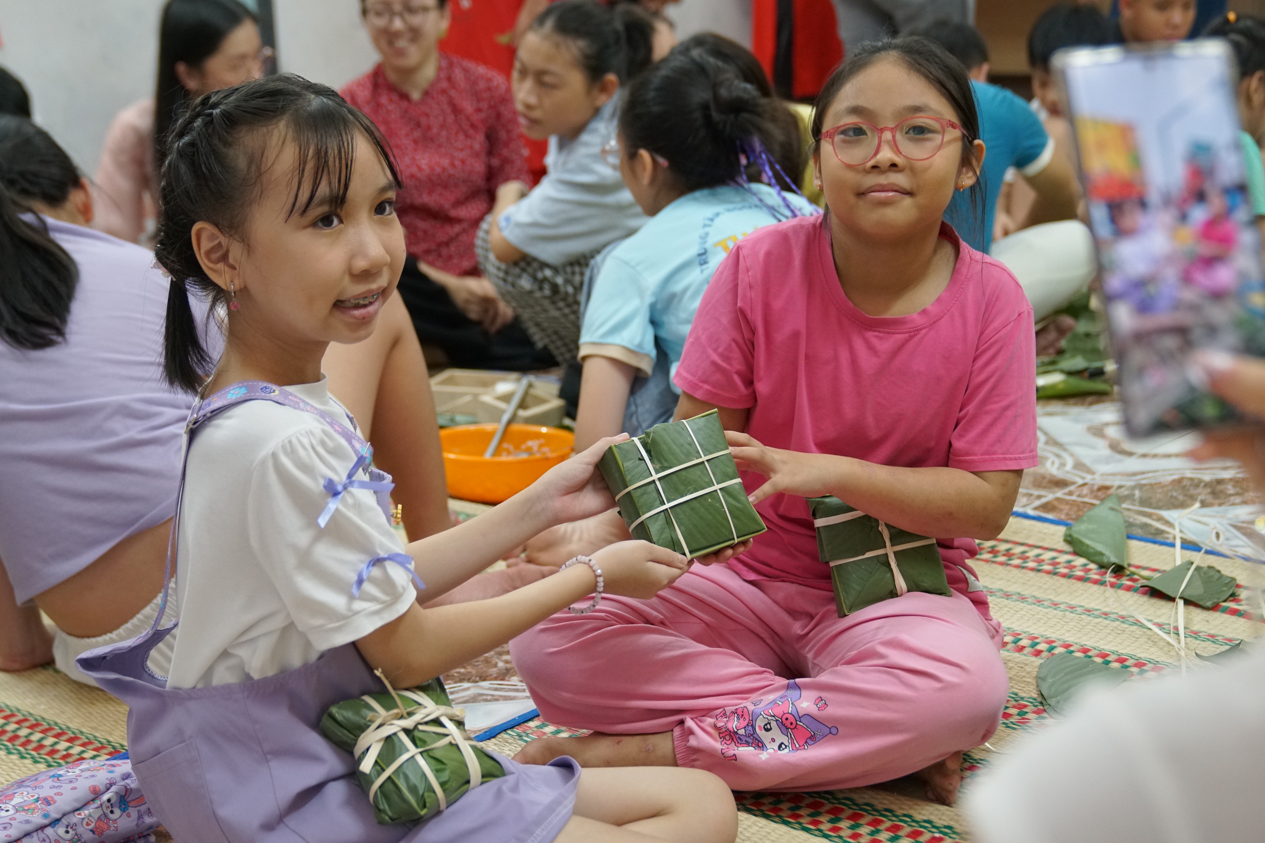 Từ học cách làm bánh chưng tới ngày hội mùa xuân- Ảnh 1.