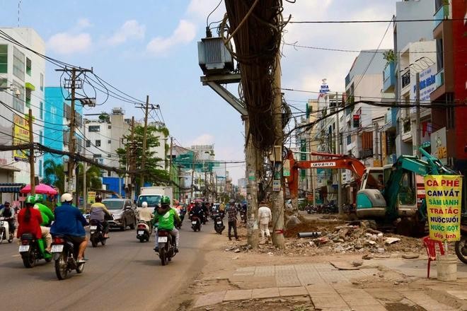 Gấp rút 'dọn' mặt bằng, người dân trông ngày metro số 2 lăn bánh ảnh 9