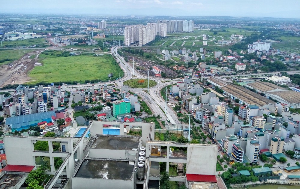 Vì sao tạm dừng trình đề án sắp xếp, sáp nhập huyện, xã theo tiêu chuẩn cũ?- Ảnh 1. Vì sao tạm dừng trình đề án sắp xếp, sáp nhập huyện, xã theo tiêu chuẩn cũ?- Ảnh 1.